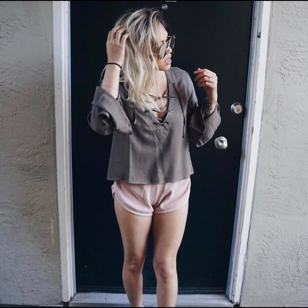Laced up top with bell sleeves